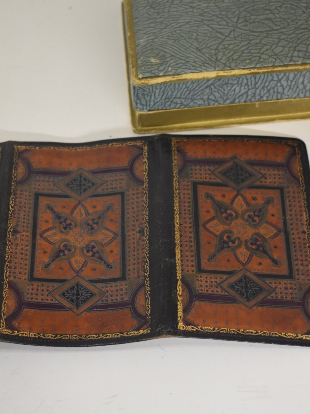 N. Raddi, Florentine Artistic Leather trifold wallet. Hand dyed/painted